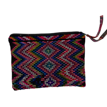 Large red cosmetic bag/clutch featuring fabric from Chichicastenango, Guatemala.
