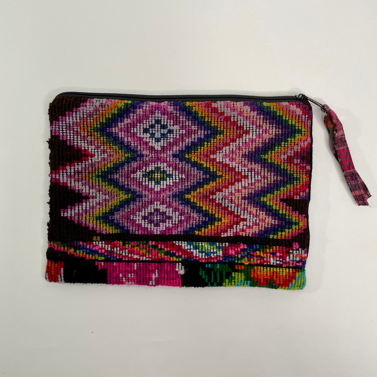 Large red cosmetic bag/clutch featuring fabric from Chichicastenango, Guatemala.