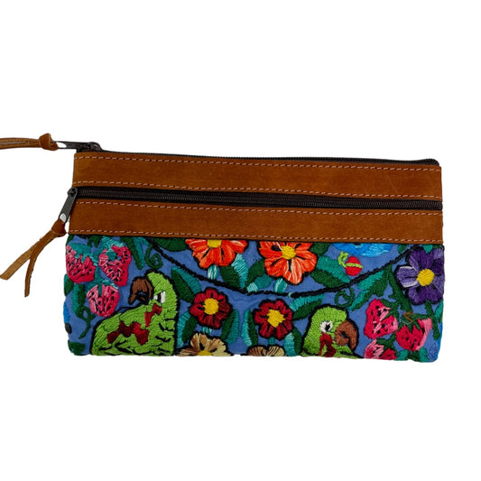 Cosmetic pouch is created with repurposed Mayan blouse material and Nubuck leather.