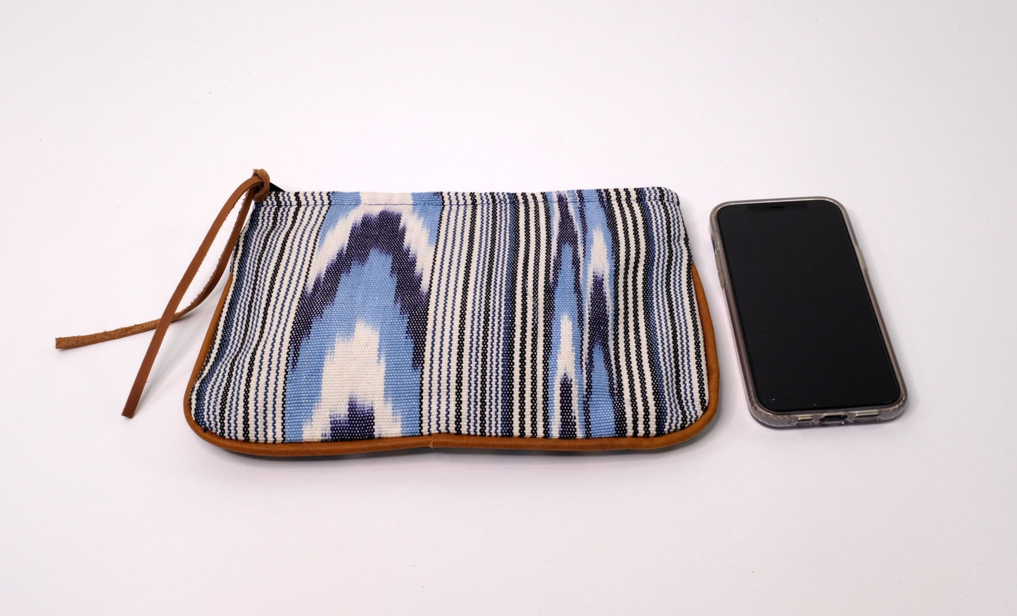 Handwoven Cosmetic Purse crafted from cotton and leather with light blue pattern.