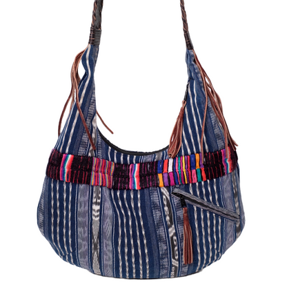 Blue handbag made with recycled Guatemala textiles, embroidery and leather fringe.